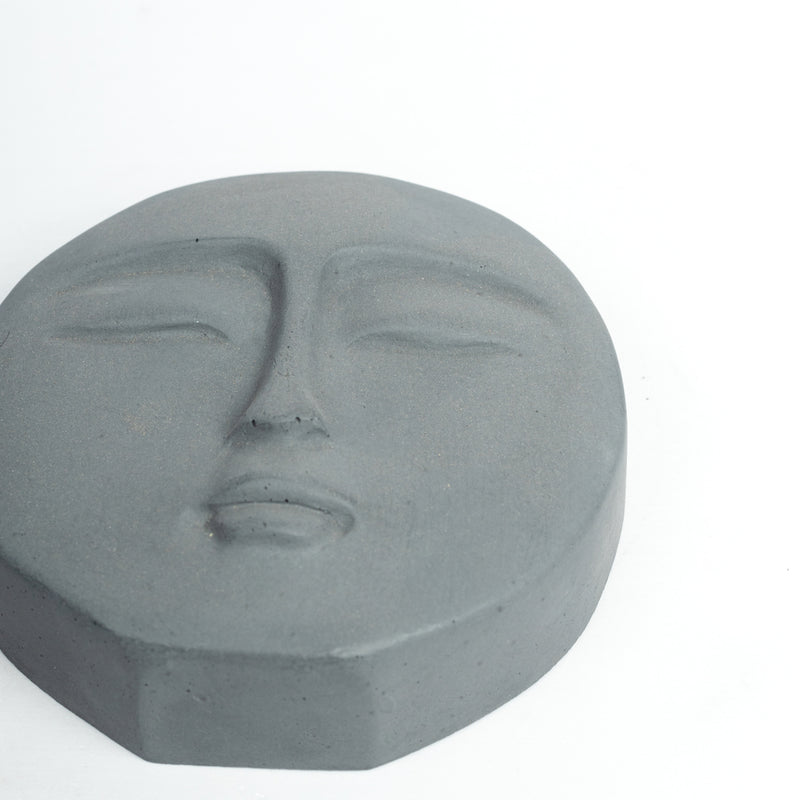 Phiz- Dark Concrete Round Face shaped Paper Weight for a work desk, office, and study table.