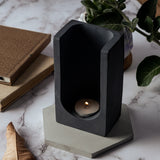 Trouval- Dark Concrete Sleek Tea light holder featuring a contemporary design