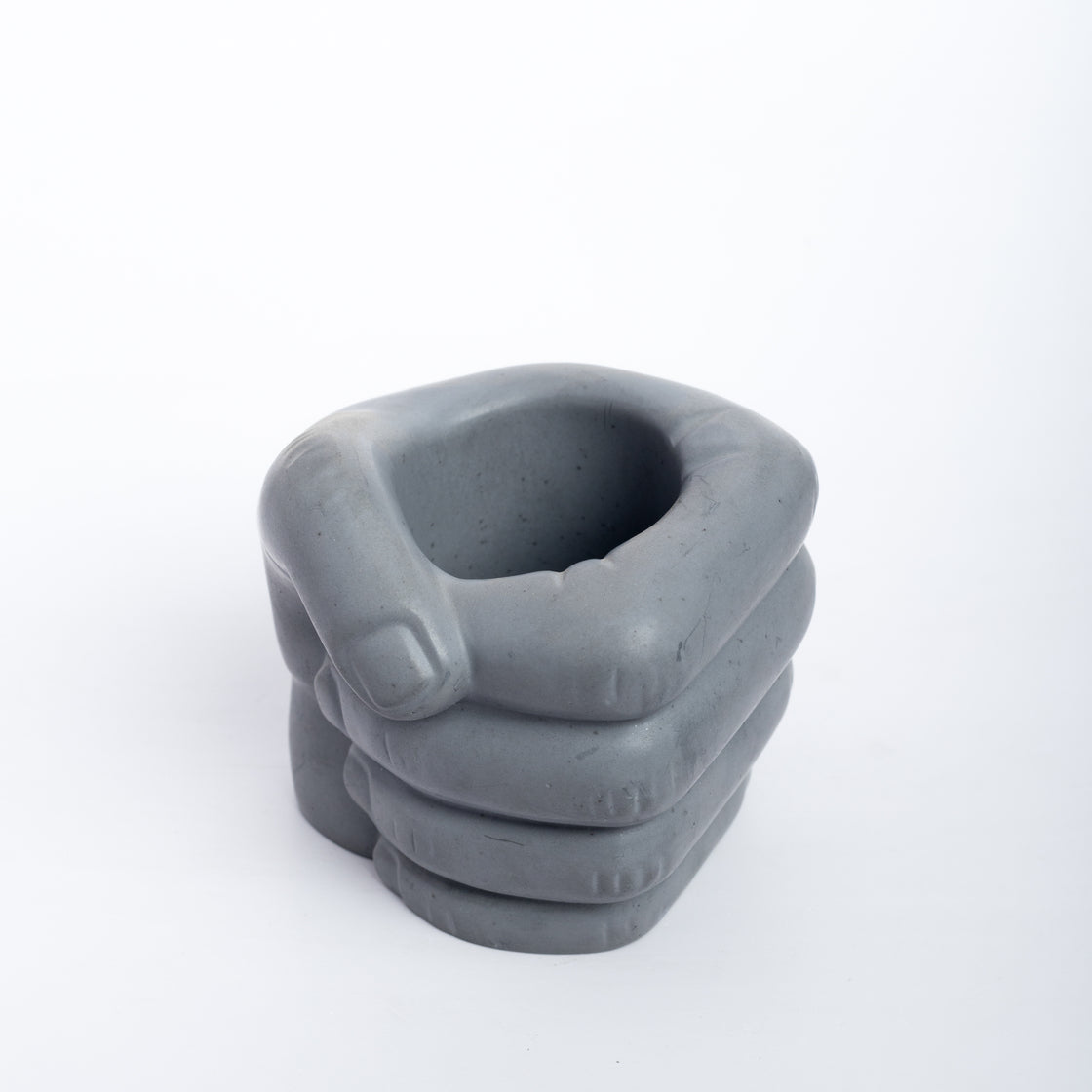 Fist Dark Concrete - Hand-shaped Decor- Pen stand and Pillar Candle Holder, featuring a clenched fist