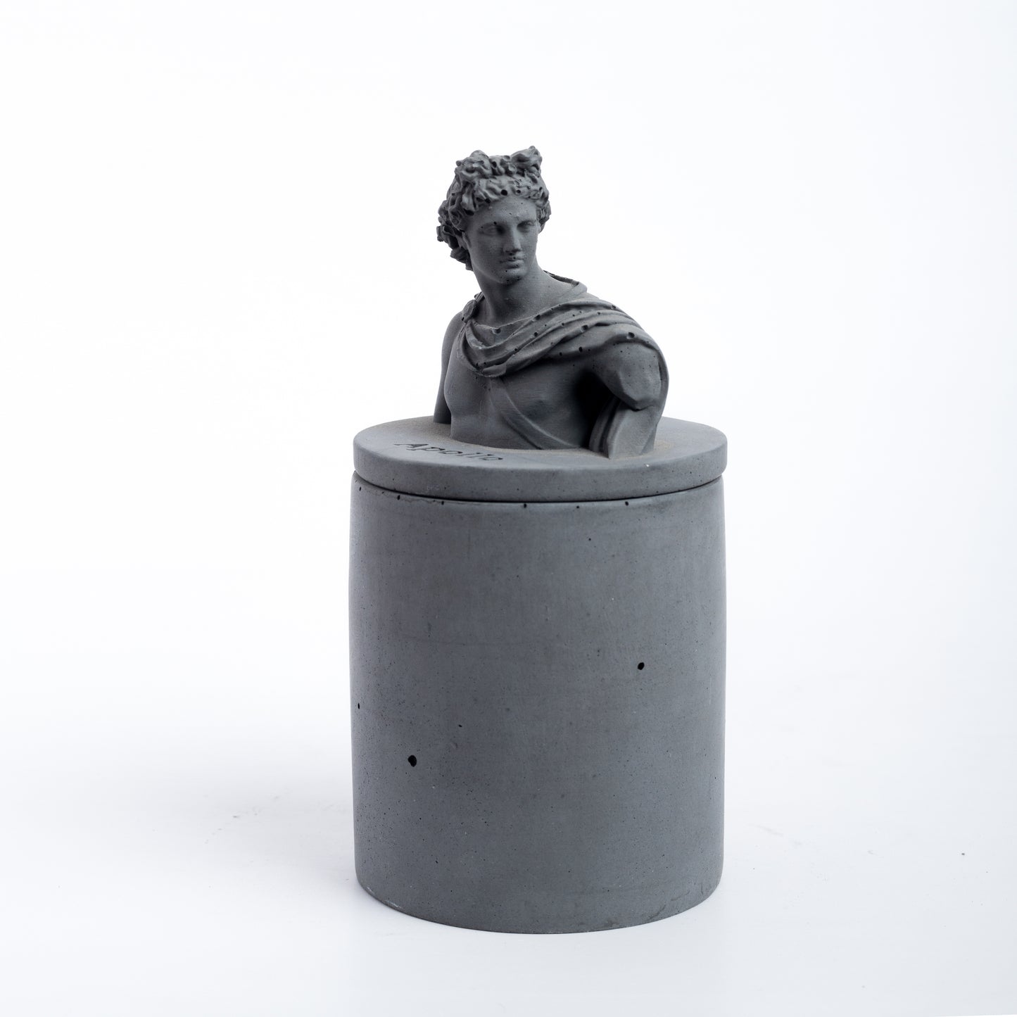 Apollo Atop Dark Concrete-Greek Home Decor- A container with a Greek God lid. Statement decor piece ideal for gifting, home, and work decor.